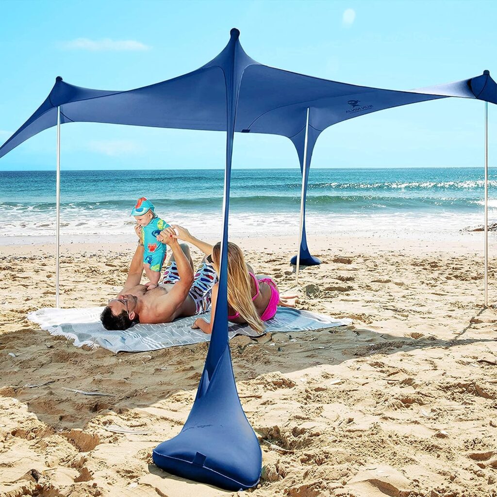 SUN NINJA Beach Tent Sun Shelter with UPF50+ Protection, Includes Sand Shovel, Ground Pegs and Stability Poles, Outdoor Pop Up Beach Shade Canopy for Camping, Fishing, Backyard Fun or Picnics SUN NINJA Beach Tent Sun Shelter with UPF50+ Protection, Includes Sand Shovel, Ground Pegs and Stability Poles, Outdoor Pop Up Beach Shade Canopy for Camping, Fishing, Backyard Fun or Picnics